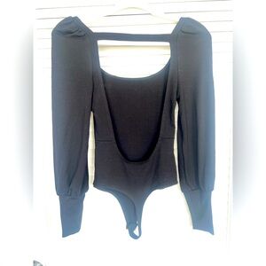 New without tags. Privacy Please x Revolve open back bodysuit.